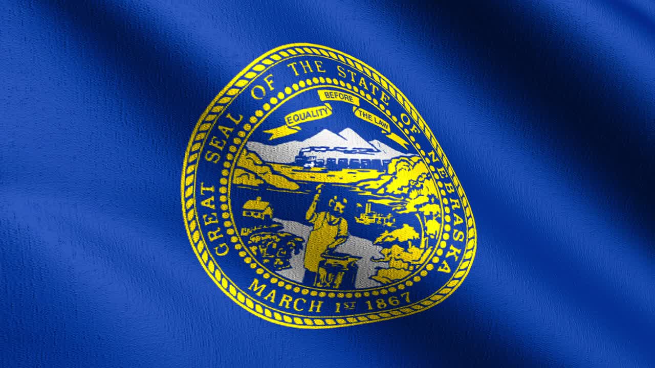 беспрерывный цикл 4k vdo. флаг штата небраска в соединенных штатах америки, сша, дующий в ветре изолированный. официальный патриотический абстрактный дизайн. 3d рендеринг иллюстрация волнующегося символа знака.