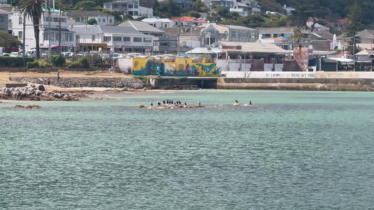View across the water at Kalk Bay, In Cape Town, South Africa