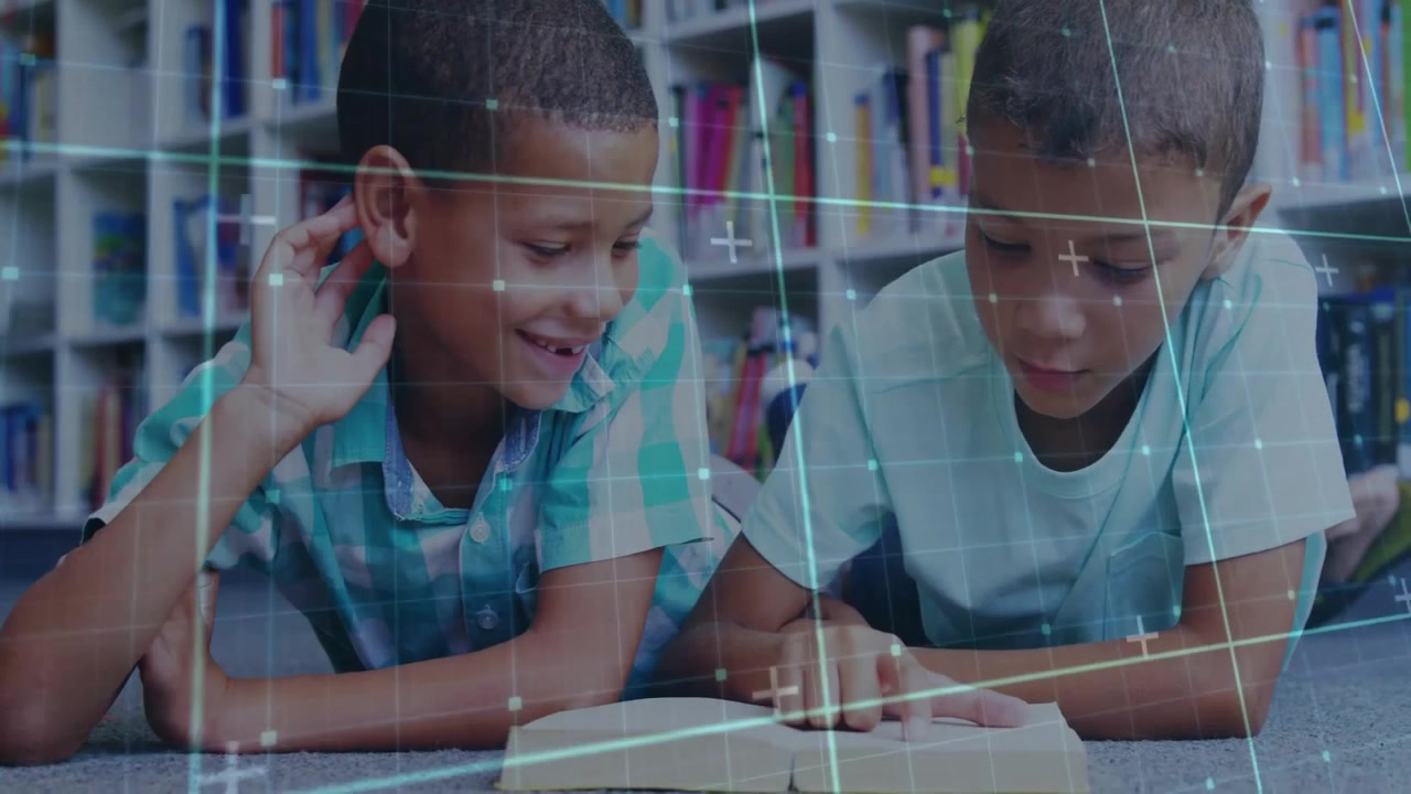 Two Young Boys Reading a Book in a Library with Digital Overlay