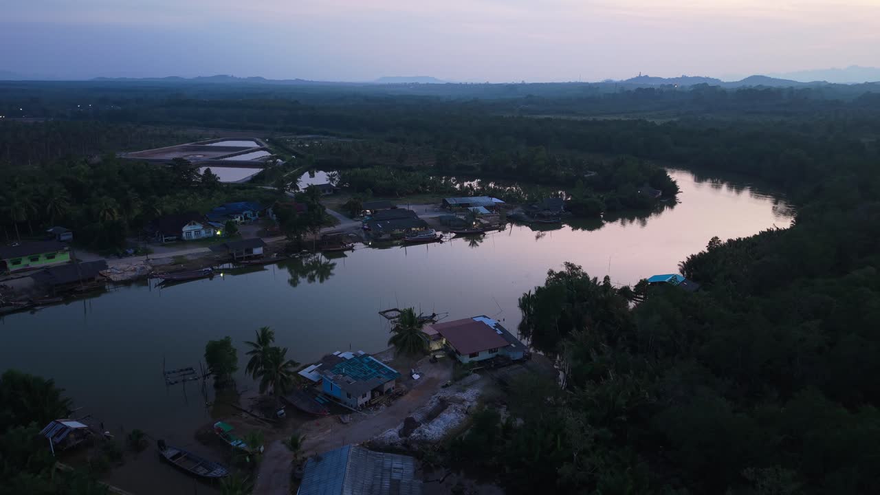 Aerial View of a Fishing Village at Sunset