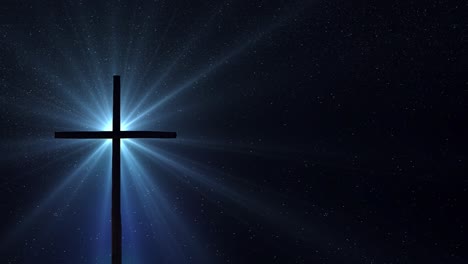 cross silhouette and optical flare rays with star background at night