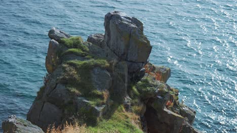 a rocky outcrop of the cliff on the fjord coast