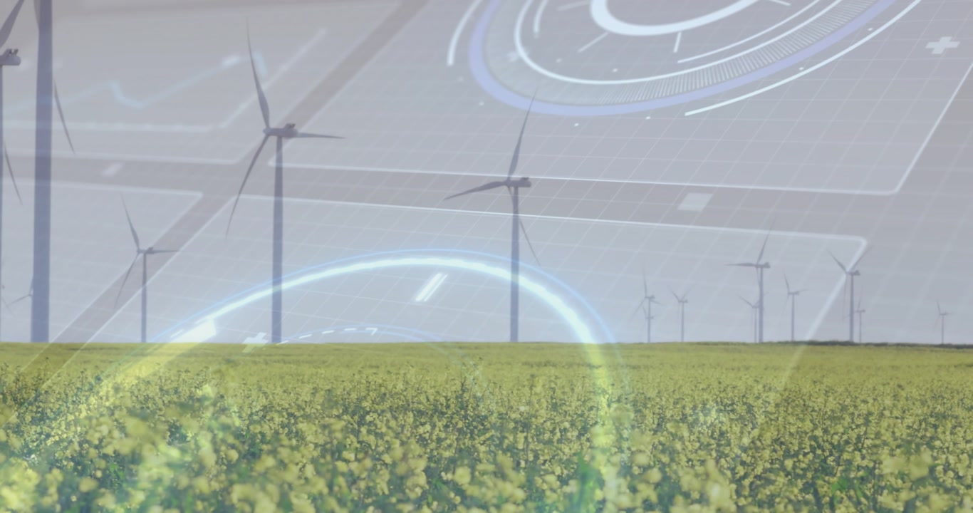 Yellow crop and wind turbines rotating while HUD overlay activating, visualizing wind energy data