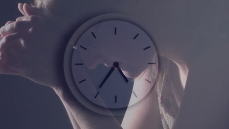 animation of clock moving fast over caucasian woman praying