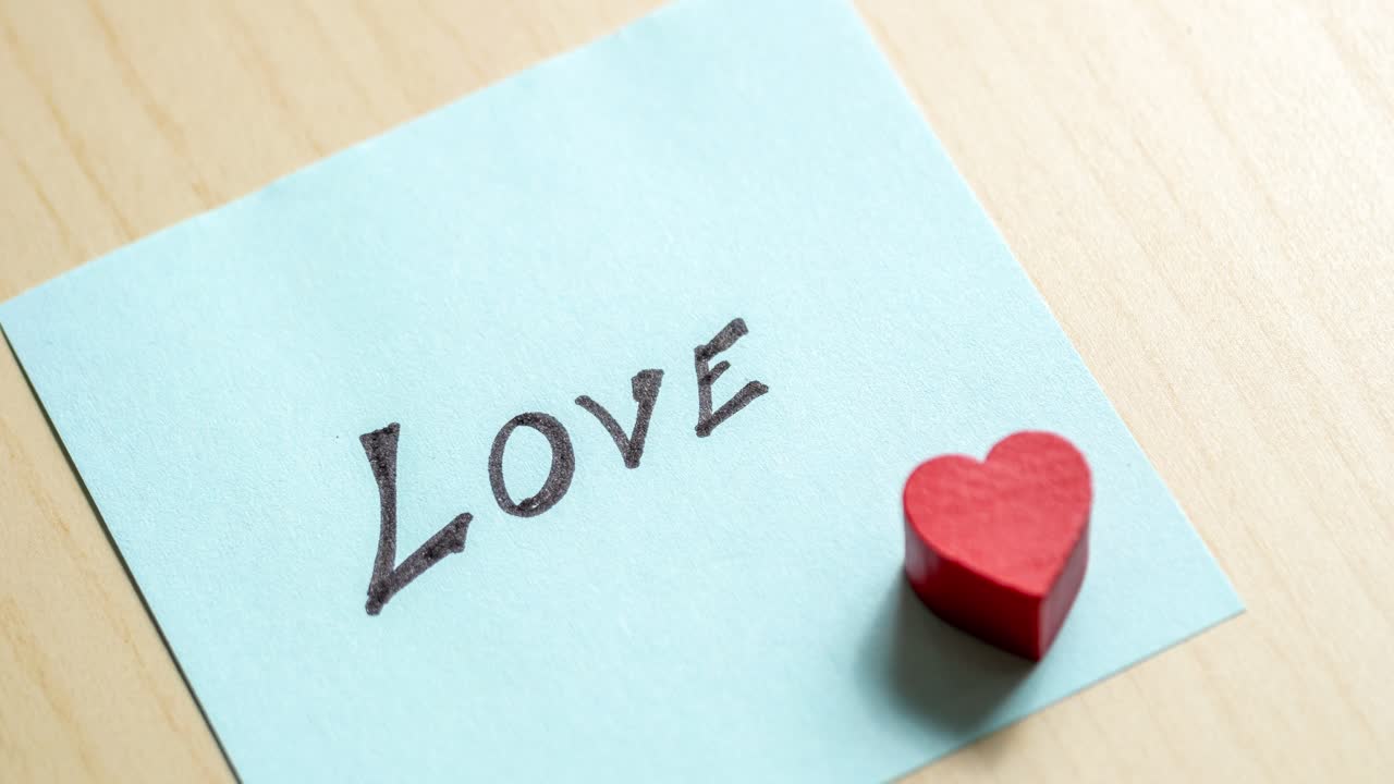 A heartfelt note showcases love featuring a heart stamp perfect for expressing emotions.