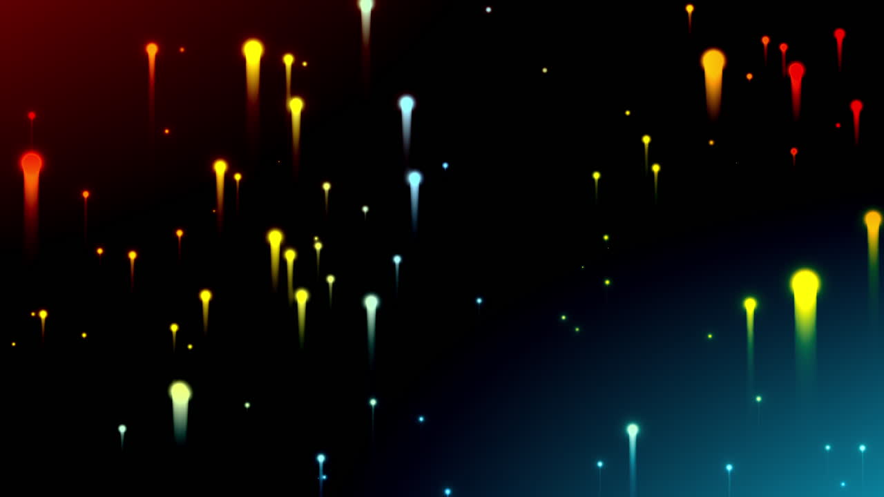 끝에서 희미해지는 흔적이 있는 작고 다채로운 입자 구름의 폭발