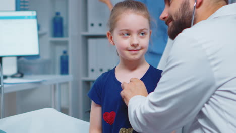 Close-up-of-doctor-using-stethoscope