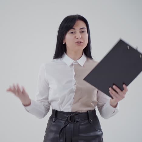 studio portrait of angry businesswoman