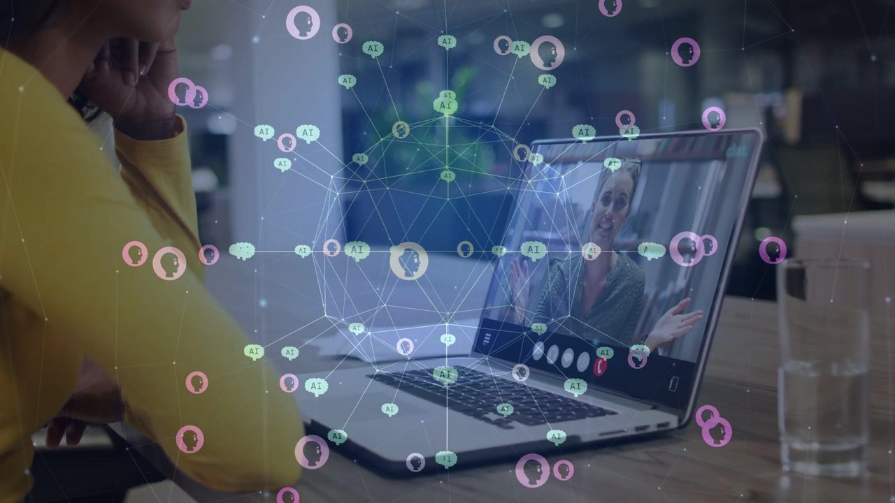Donna che si appoggia alla mano ascoltando mentre un collega gesticola su un laptop con nodi animati che si spostano, per il business
