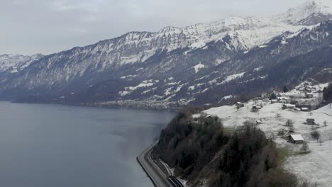 Drone-aerial-of-the-Lake-Thun-Thunersee-in-winter