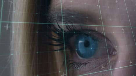 animation of data processing over eye of caucasian woman