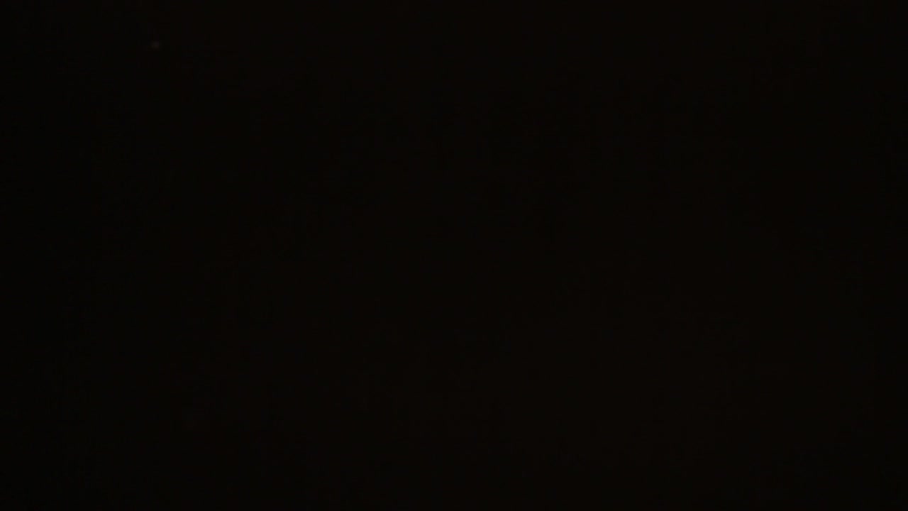 Dark Abstract Background with Faint Floating Dust