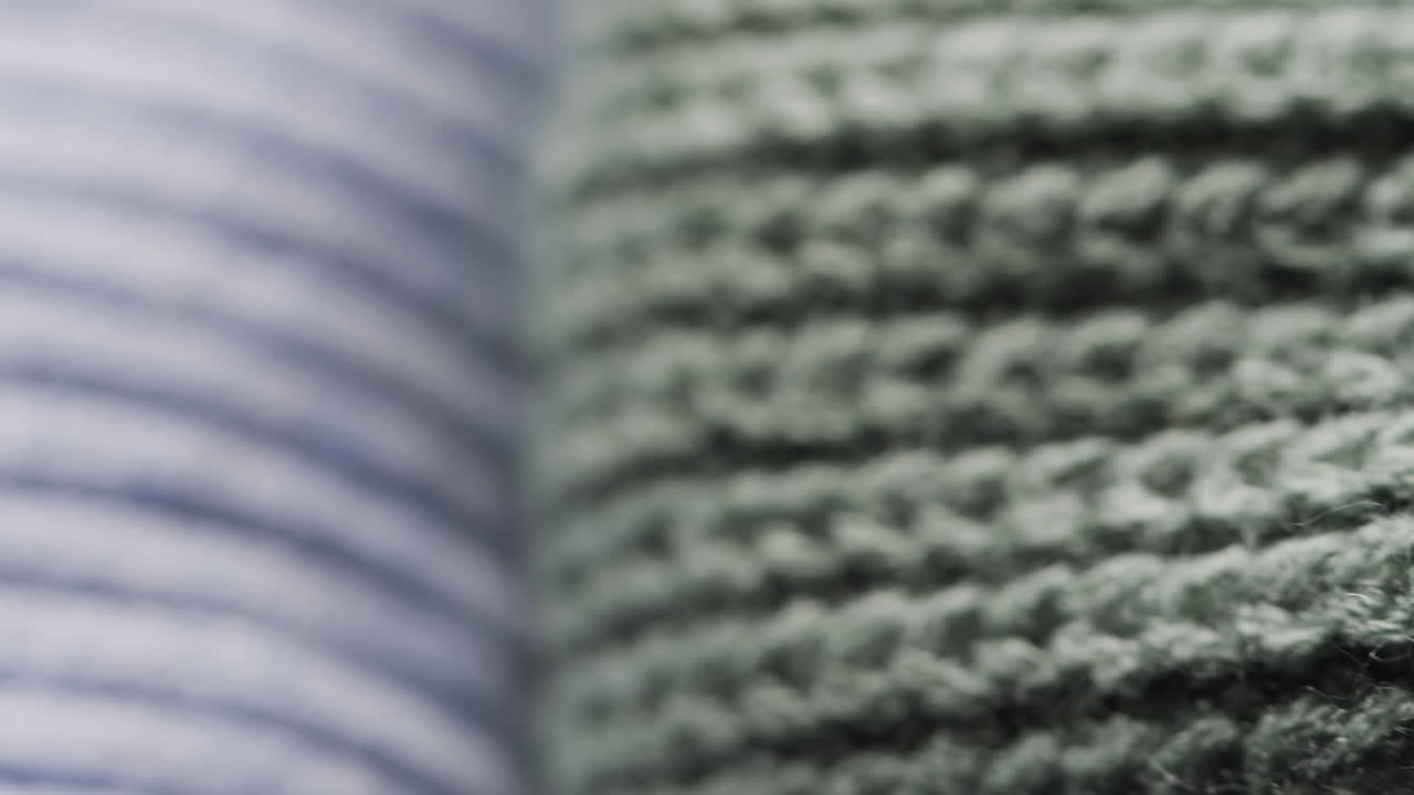 복사 공간과 함께 파란색과 녹색의 양털 크로 ⁇  천의 클로즈업의 마이크로 비디오