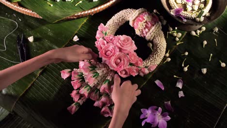 making of beautiful, exotic flower garland, close up