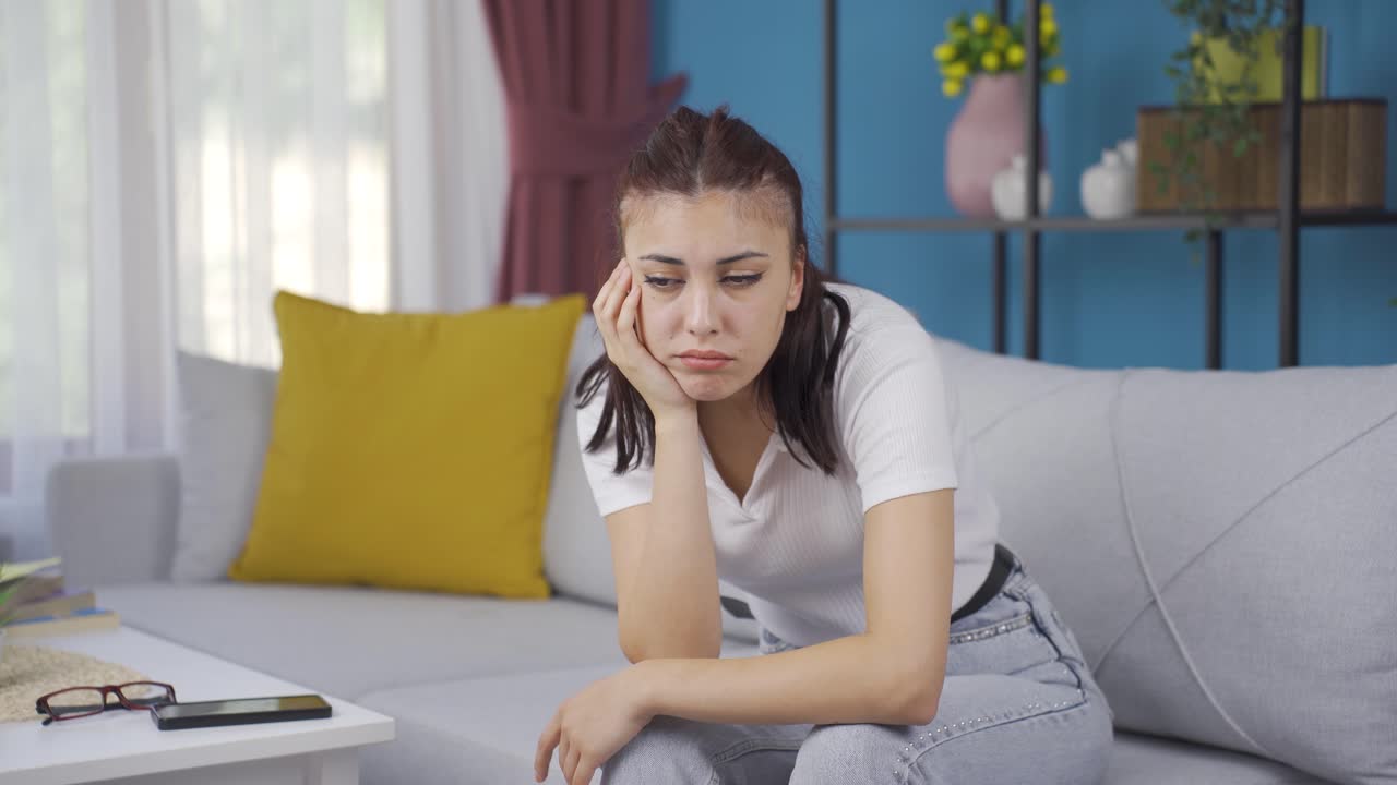 The young woman who doesn't feel well.