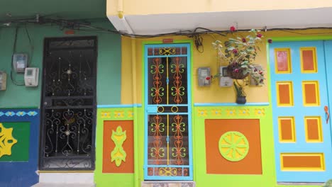 colorful doors in guatapé, colombia, showcasing vibrant street art and unique local architecture