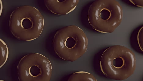 chocolate glaze donuts on a dark background