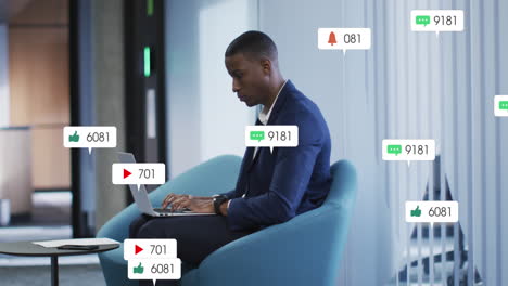 Animación-De-Barras-De-Notificación-Sobre-Un-Hombre-Afroamericano-Trabajando-En-Una-Computadora-Portátil-En-La-Oficina