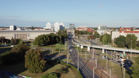 Aerial-shot-over-the-Grunwald-bridge-and-towards-the-Eastern-cityscape-of-the-city-of-Wroclaw,-Poland