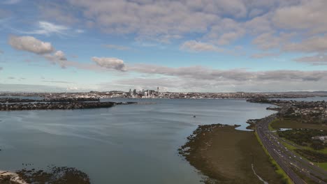 Panoramic aerial view of Auckland city, with Shoal Bay in the background