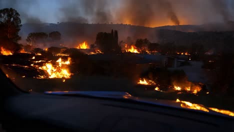 wildfire engulfing homes and landscape