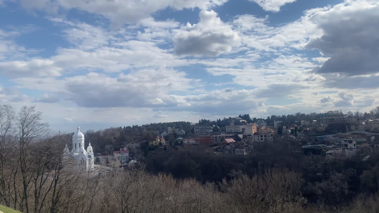 View from Motherland Monument over brown city nature and church, Kyiv Ukraine