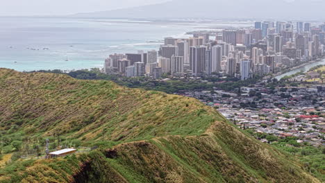 honolulu hawaii usa, aerial view of city beachfront buildings from top of diamond head, drone shot