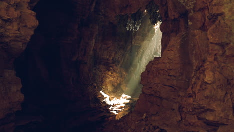 light shining through a cave entrance