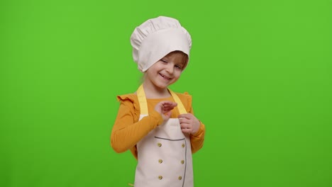 child girl kid dressed as cook chef waving hands, asking to follow or join, welcome, hello gesture