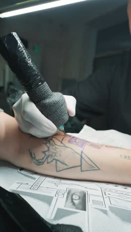geometric deer tattoo in progress