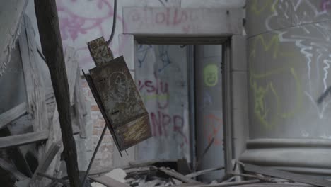 closeup-day-interior-of-broken-light-fixture-in-abandoned-house