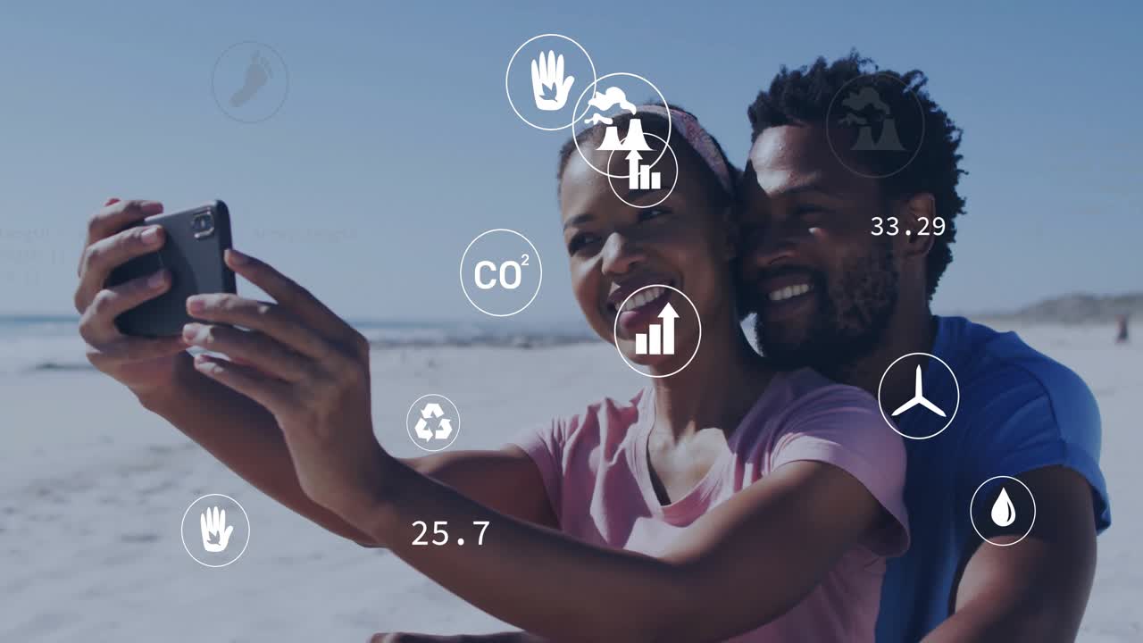woman and man taking selfie on beach, showcasing environment tech with floating eco icons and data