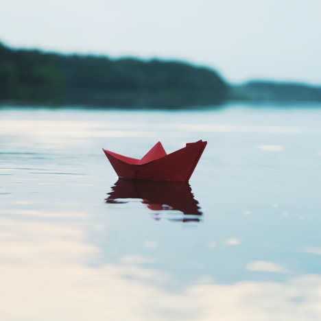 paper boat floating on water