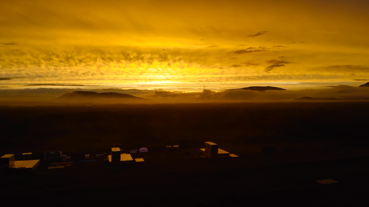 Golden Sunset over Misty Mountains