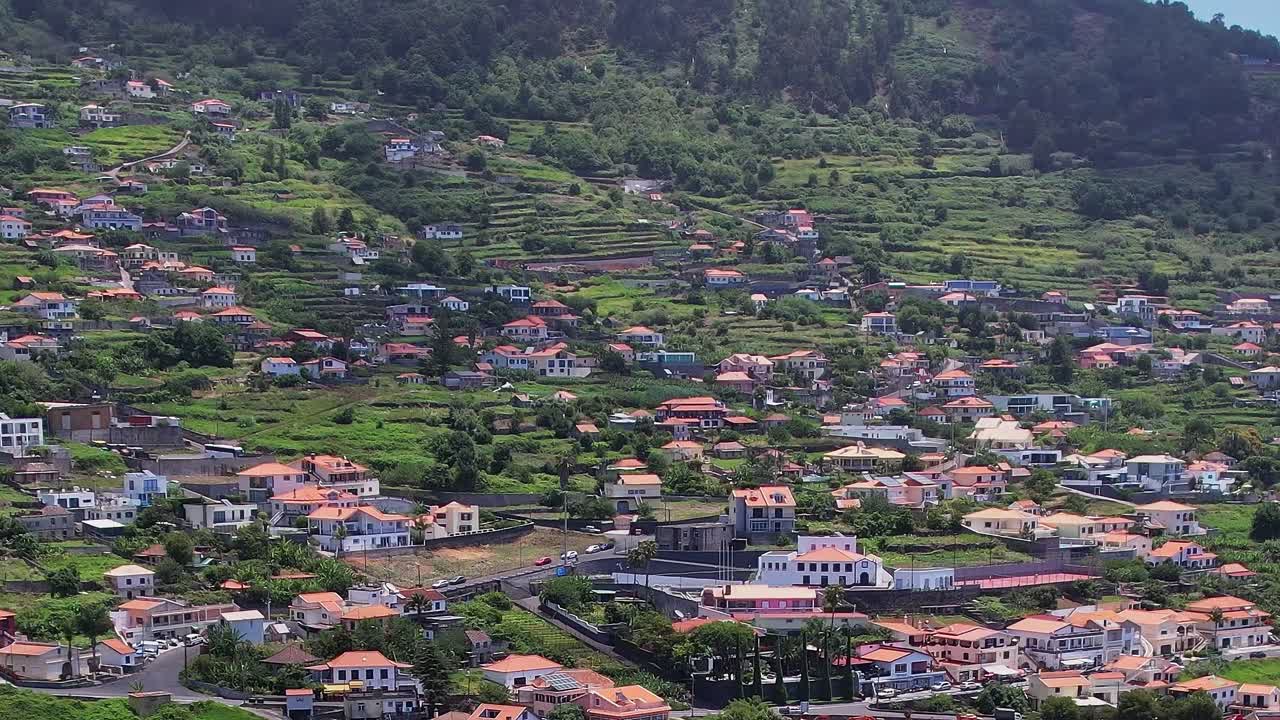Stunning aerial view of Madeira's hillside homes and lush landscapes