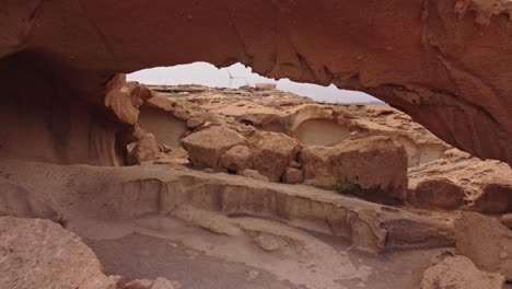 arco de tajao wonderful nature rock formation in tenerice, aerial dolly out