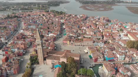 Aerial-view-of-panorama-of-painted-house-facades-of-Burano-island-a-province-of-Venice-in-Italy-in-a-sunny-day