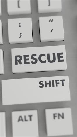 el botón de rescate presionado en el teclado vídeo vertical