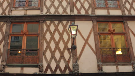 angers, france: tilt down shot of exterior of half-timbered building in historic center of angers loire, france at daytime