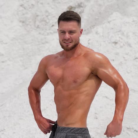 bodybuilder athlete showing muscles