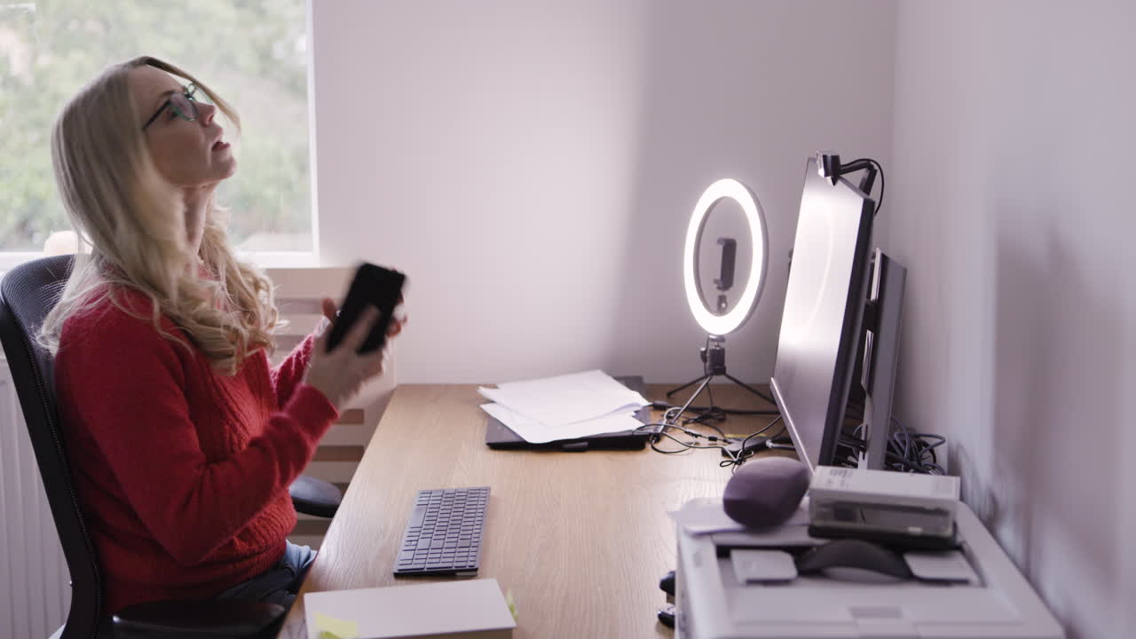 Woman on Phone in Home Office