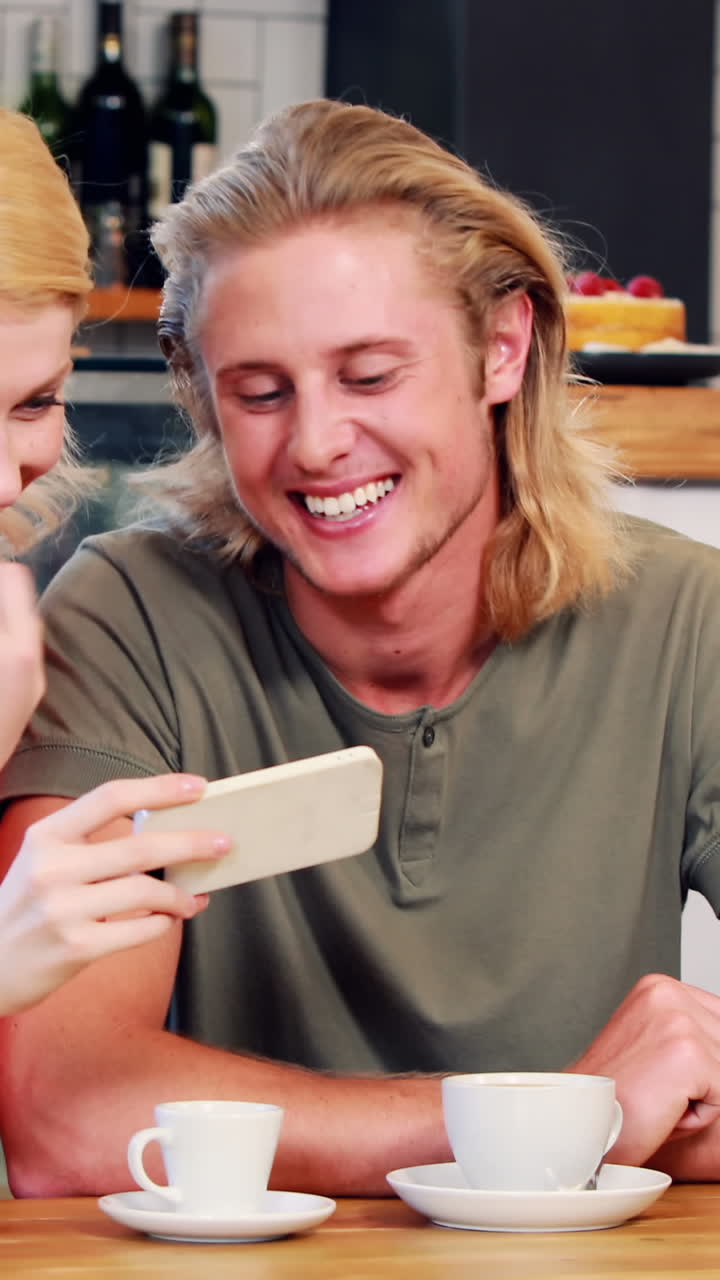 Smiling couple taking a selfie