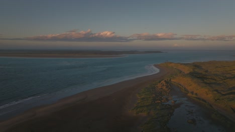 Beautiful-Omaui-beach-in-southern-New-Zealand-at-sunset,-aerial