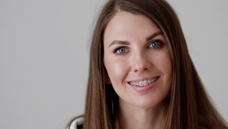woman with braces smiling