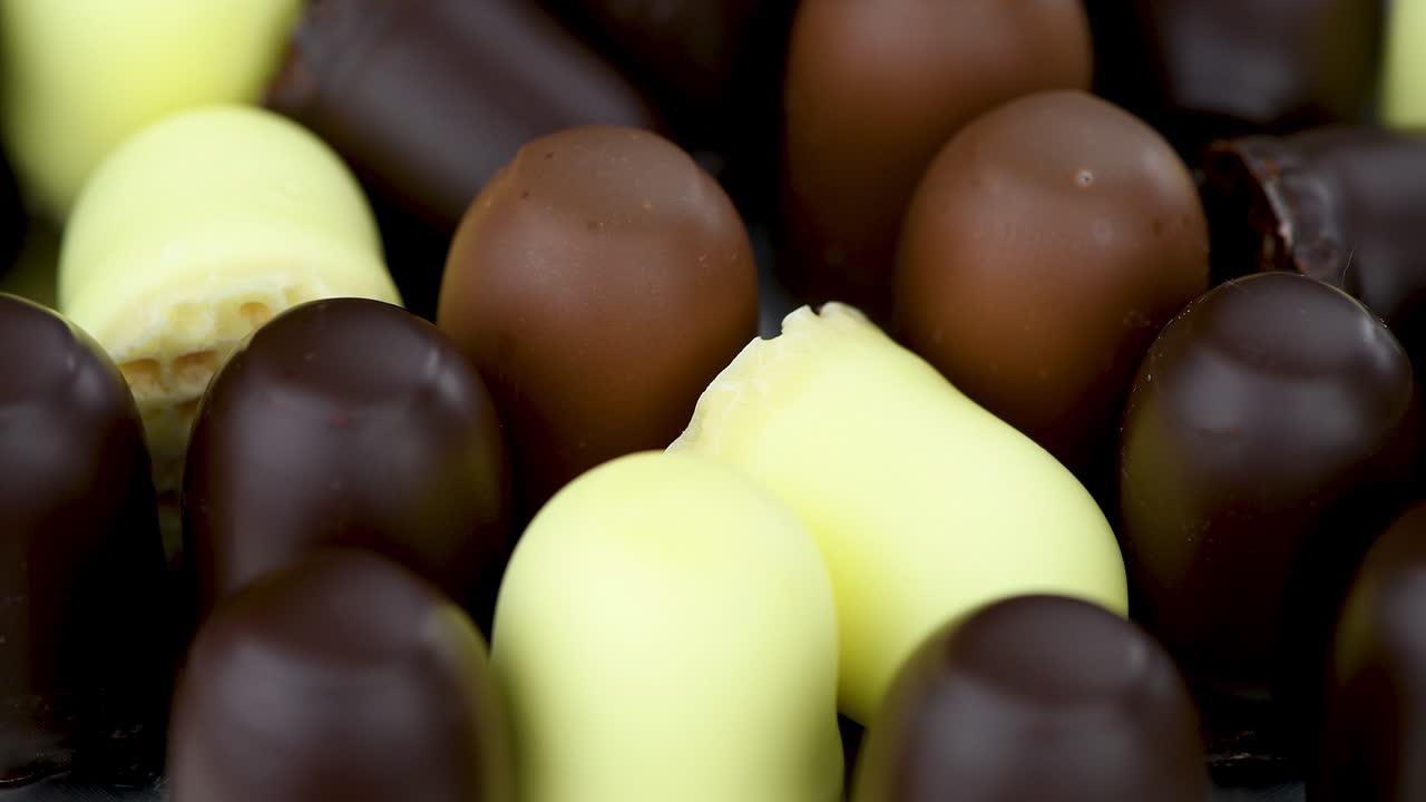 marshmallows de chocolate como imágenes de bucle sin costuras