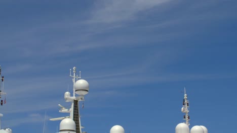 looking at yacht's radars in a marina