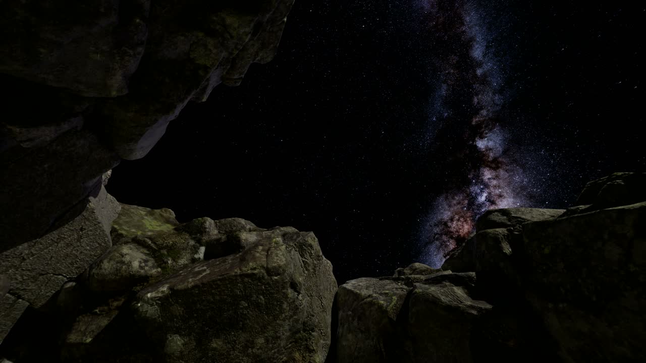 4k astrofotografía rastros de estrellas sobre las paredes del cañón de piedra arenisca.