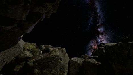 4k astrophotography star trails over sandstone canyon walls.