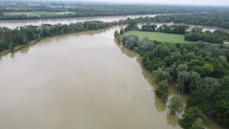aerial view of a flooded river and surrounding land
