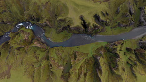 aerial: bird's eye view of fjadrargljufur canyon in iceland